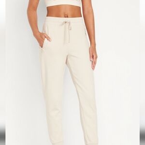 Color Bone,Sport dynamic fleece, zipper on pockets ,size medium ,dressy  joggers